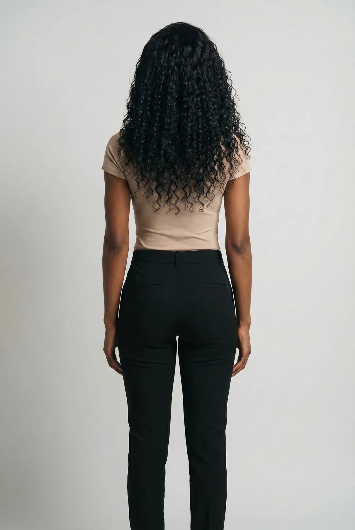 Sofia wig model - back view showing full curl